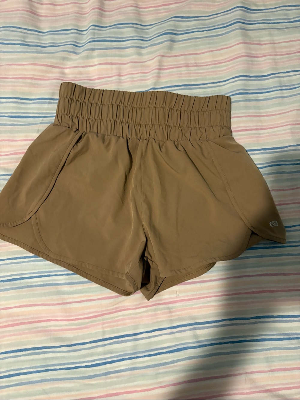 Quiet storm Women’s High-Waist Athletic Shorts in Tan